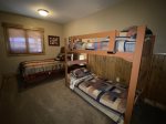 Lower level bedroom with queen/ bunks